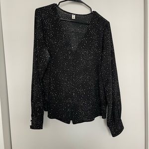 Black v-neck blouse with small celestial theme